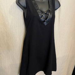 Black minidress with faux leather back details