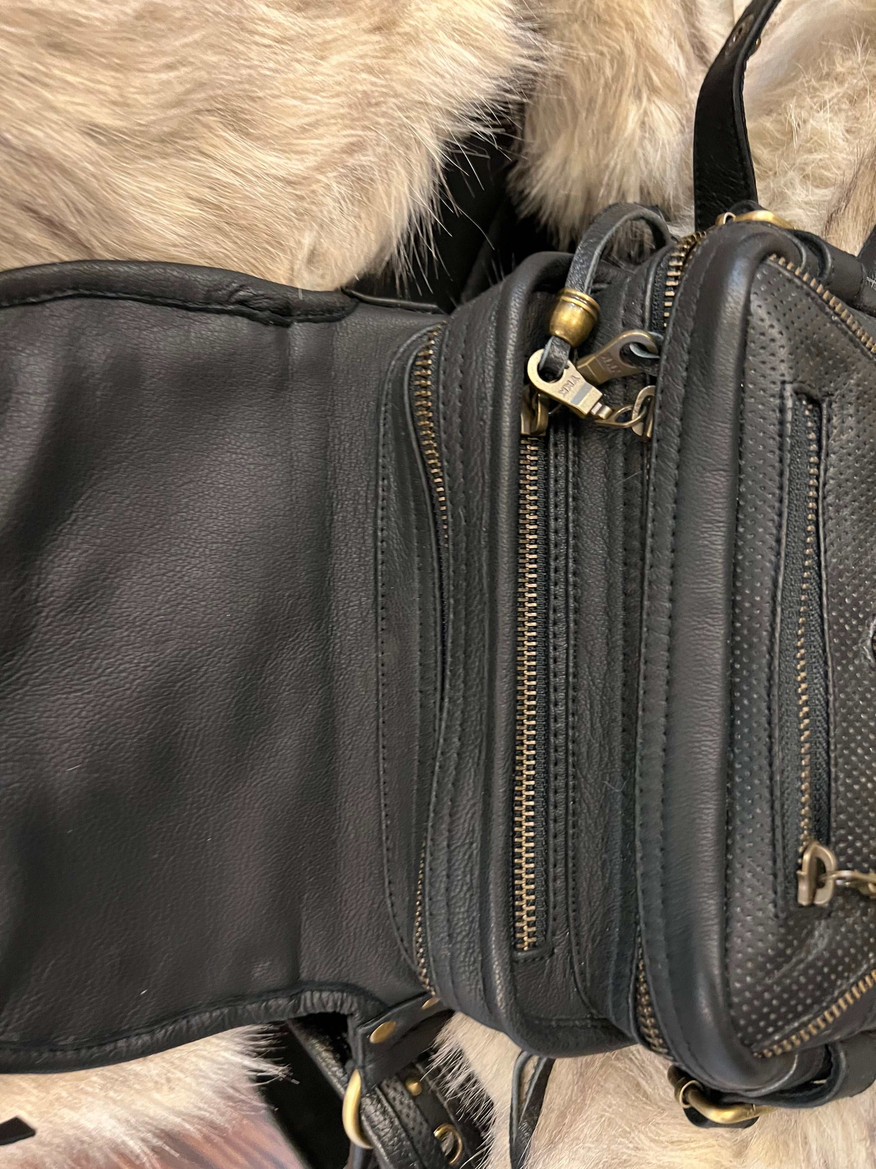 Bespoke leather bag with brass details & belt