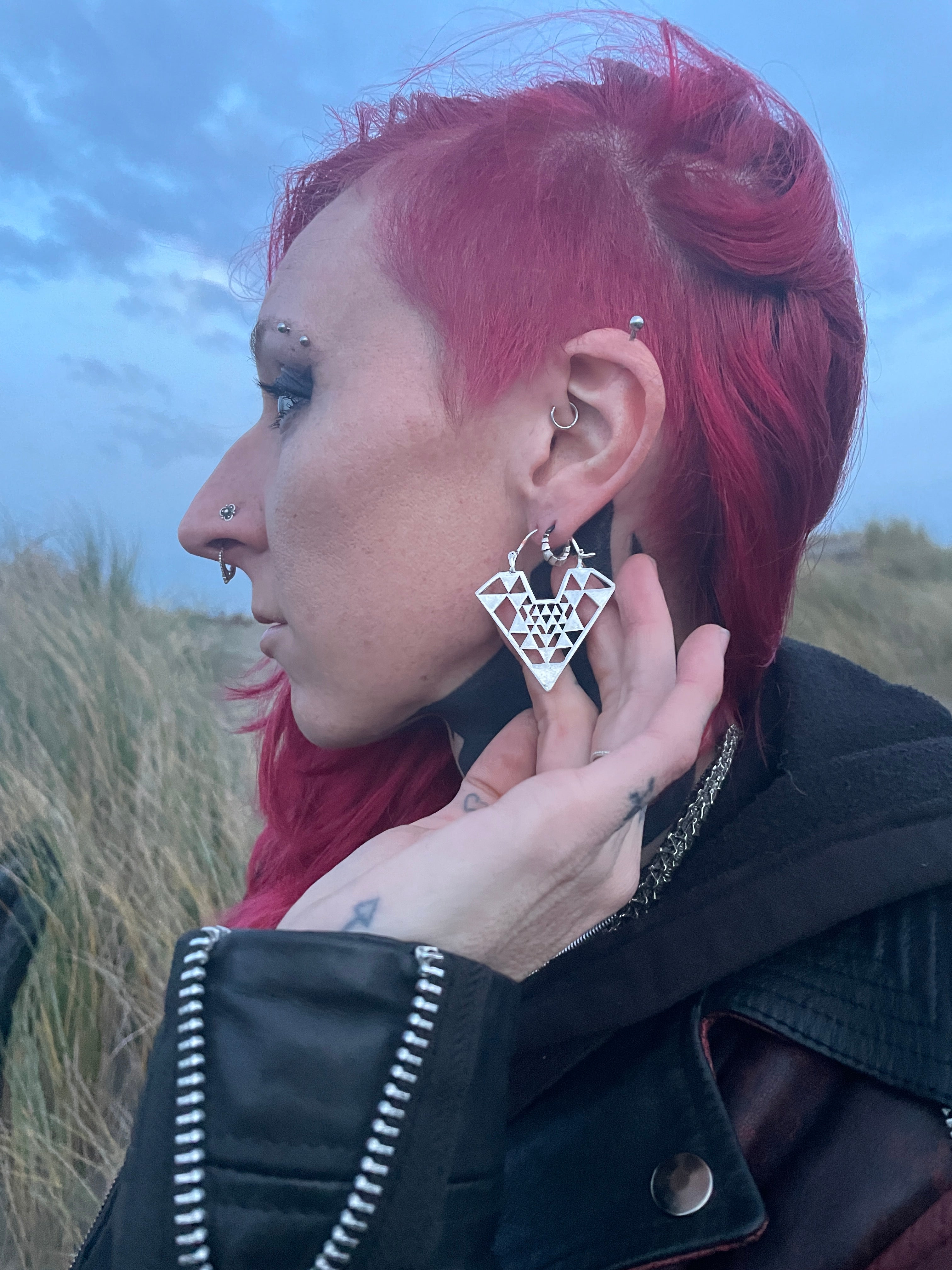 White Metal Earrings in Triangle Shape